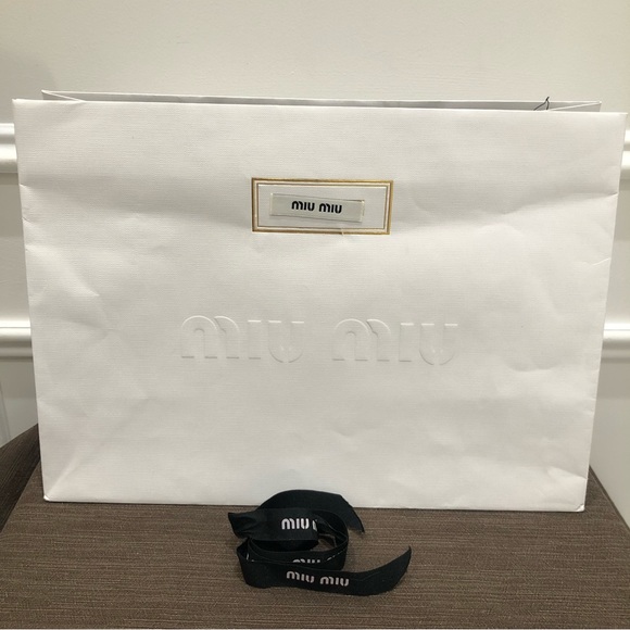 Authentic MIU MIU gift bag with MIU MIU ribbon. Very good condition. - Picture 2 of 3